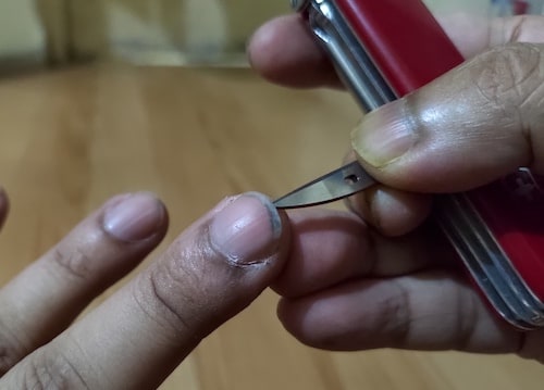 SAK Awl for cleaning fingernail