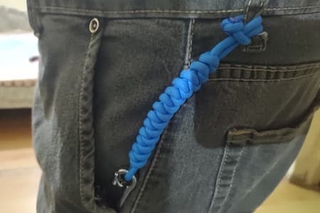 Paracord lanyard attached to belt loop